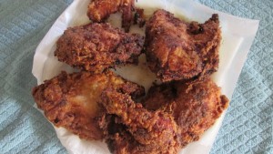 Oh yeah that is mango fried chicken. Its not burned that is mango coming through the flour and caramelizing. Sooo good!