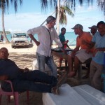 chef talks to some local dominican fisherman i